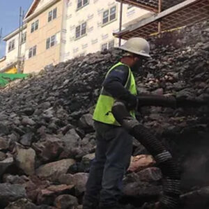 man installing an earth blanket